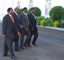 President Mwai Kibaki walking alongside VP Kalonzo Musyoka PM Raila Odinga and DPM Musalia Mudavadi at State House Nairobi