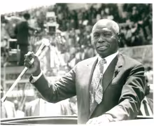 President Daniel Arap Moi acknowledging cheers from Wananchi during the Moi Day Celebrations at Nyayo National Stadium