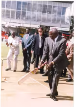 President Daniel Arap Moi tries his hand in cricket as he is cheered by leaders at Gymkhana Club in Nairobi